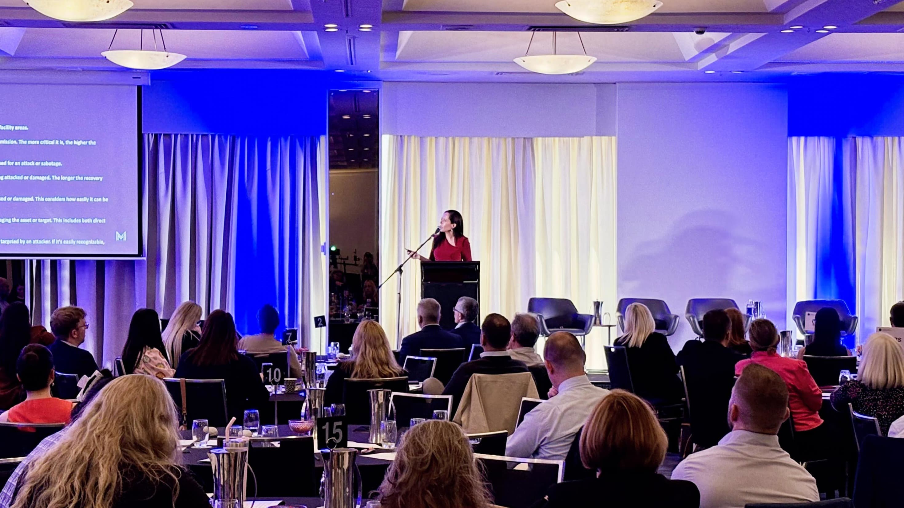 Hayley van Loon speaking at event